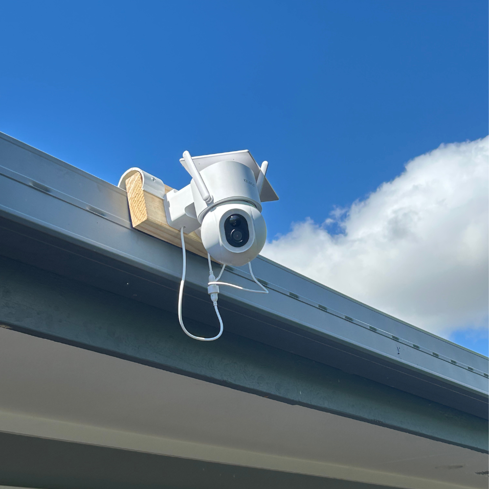 Camera hooked over a gutter